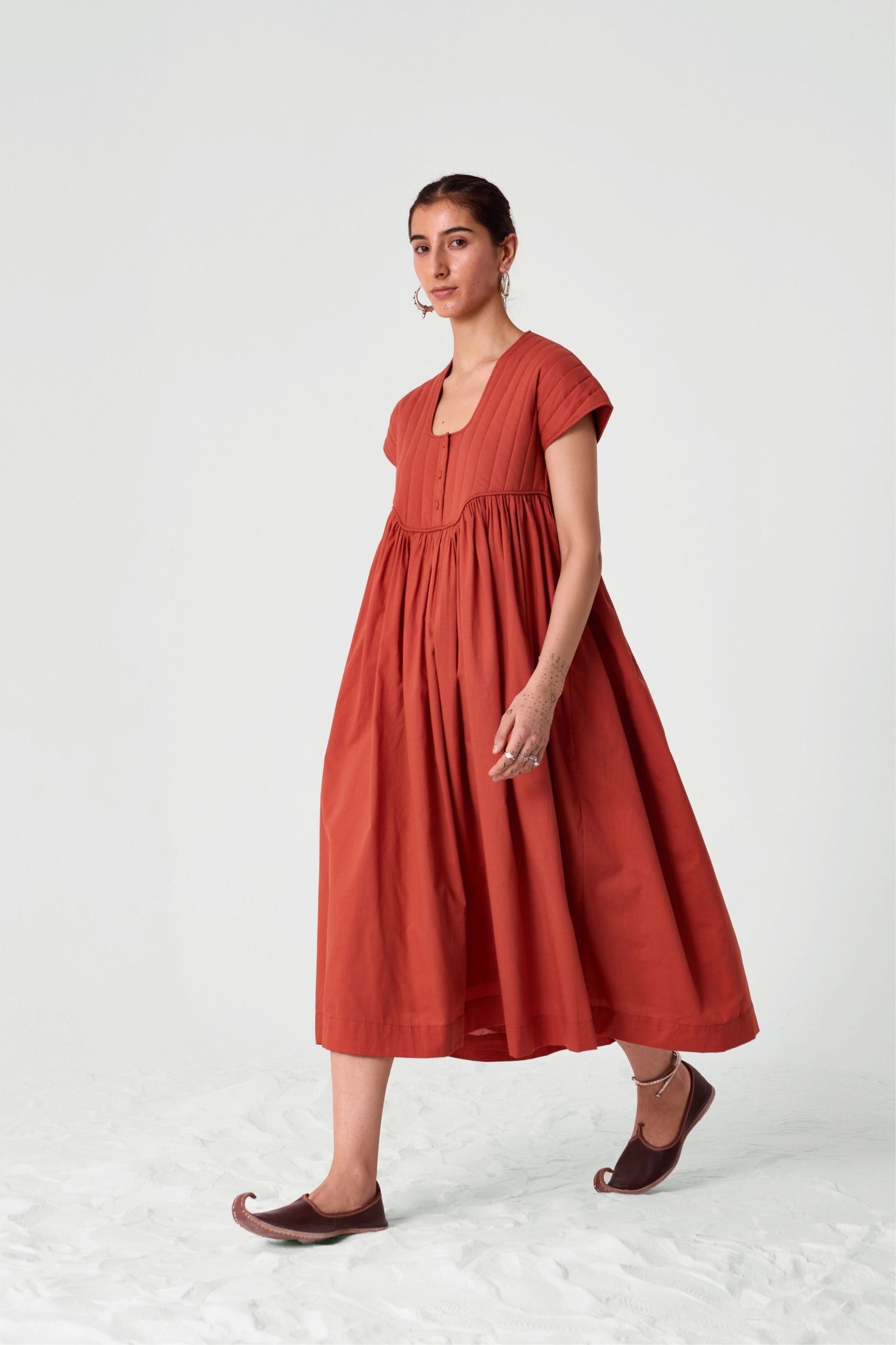 Tapti Orange Quilted Midi Dress